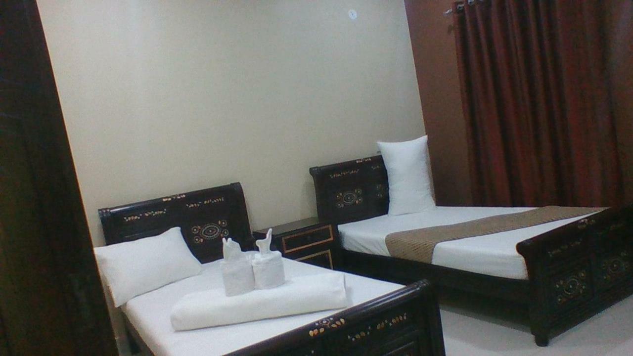 Red Roof Hotel Sahiwal Bagian luar foto